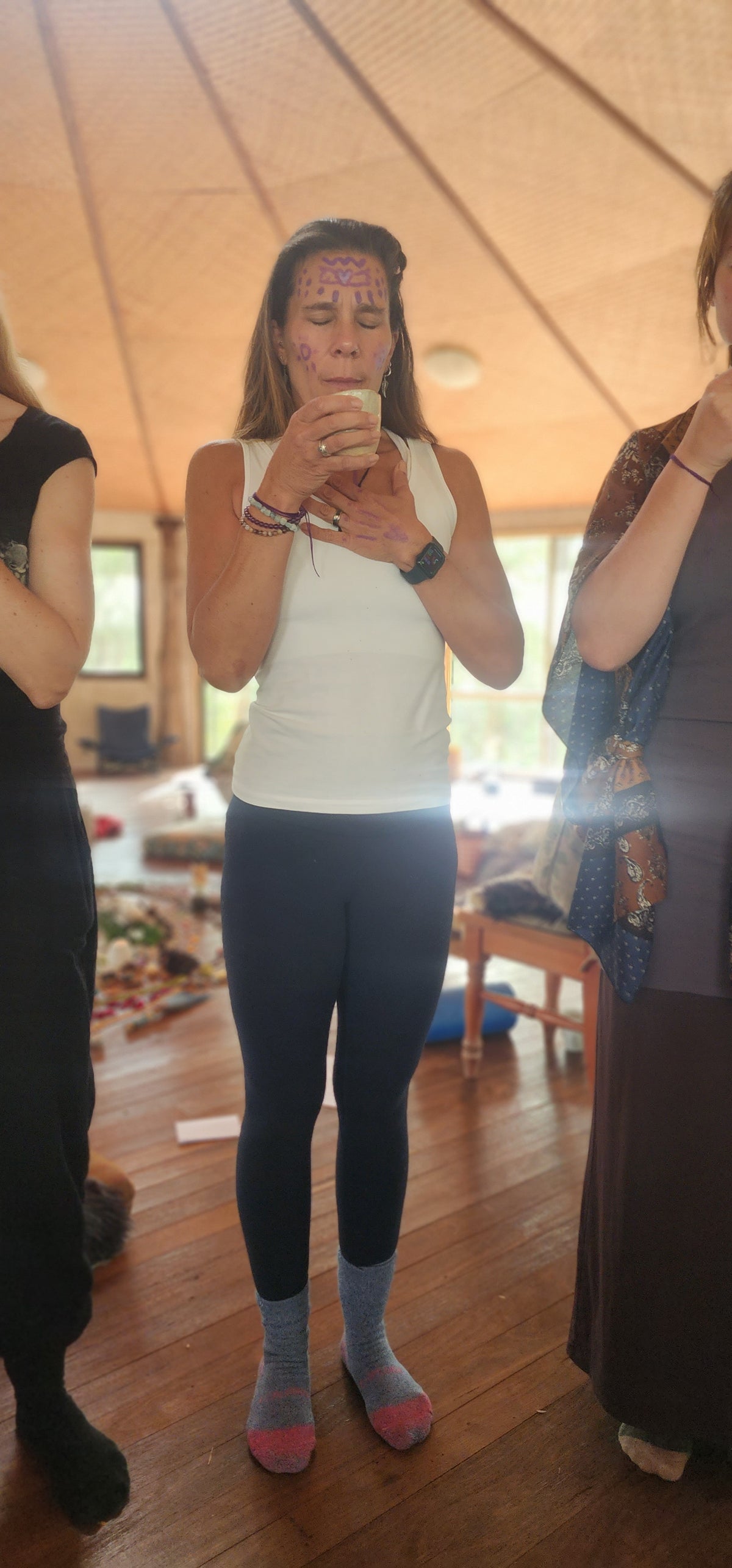 A woman held in blessing