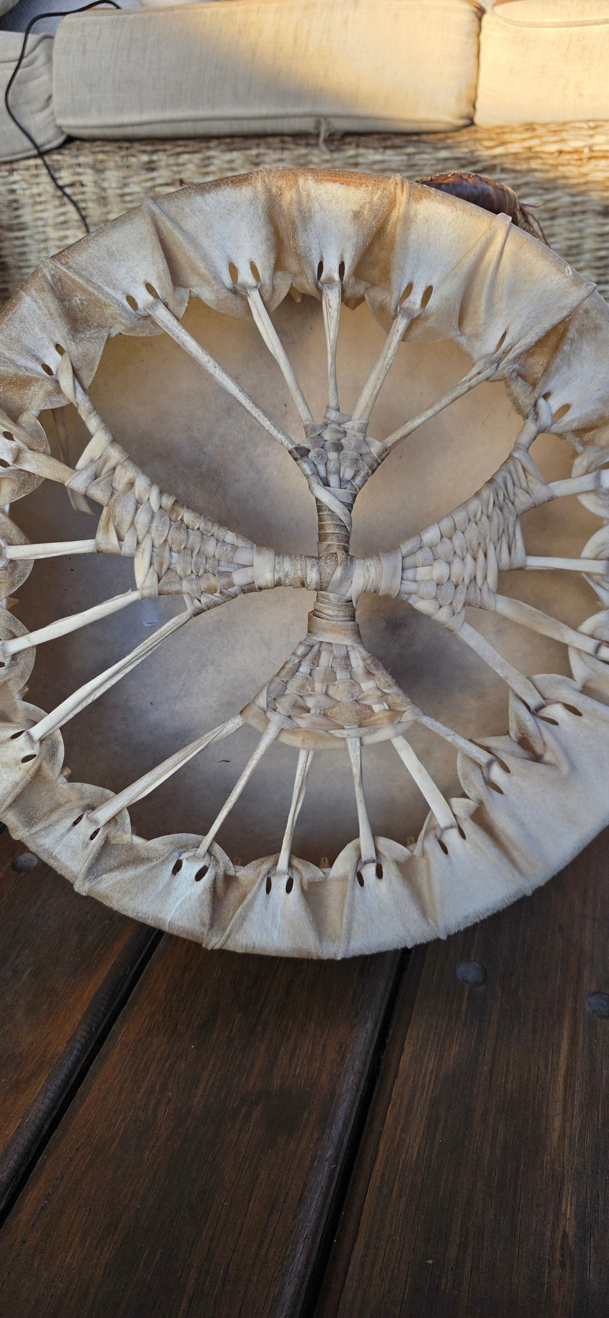 A hand-laced medicine drum from a Drum Birthing ceremony
